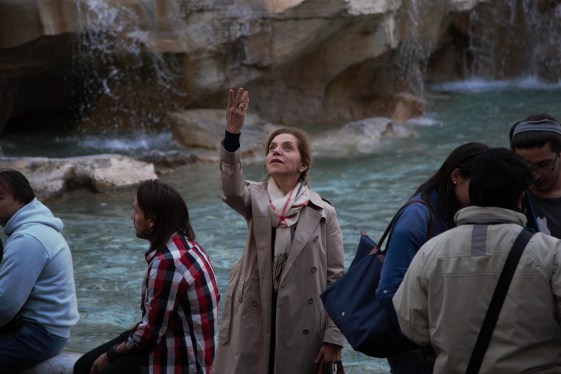 Coin toss at Trevi Fountain